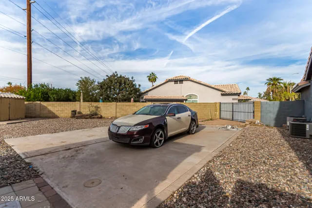 a car parked in front of a house