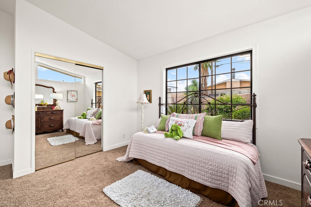 249 Alru Street Rialto, CA 92376 - Photo 18 of 33 Bedroom with mirrored closet doors and natural light