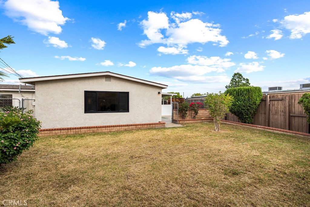 249 Alru Street Rialto, CA 92376 - Photo 22 of 33 Backyard view with lawn area