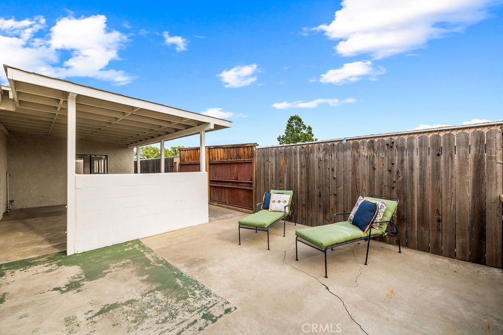 249 Alru Street Rialto, CA 92376 - Photo 26 of 33 Patio with extended concrete and privacy fencing