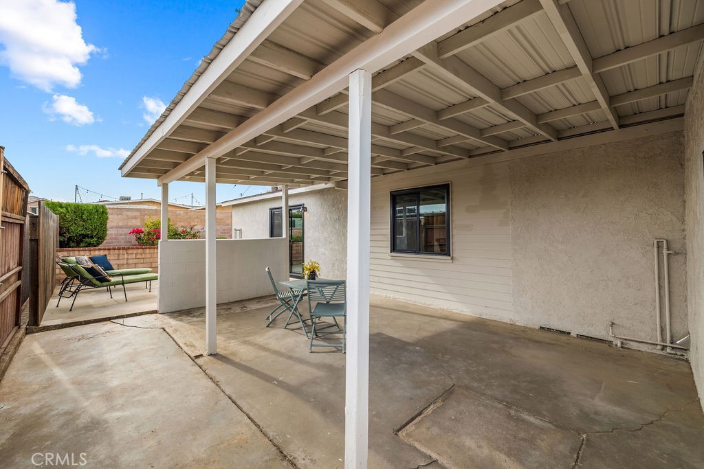 249 Alru Street Rialto, CA 92376 - Photo 27 of 33 Covered patio with shaded seating area