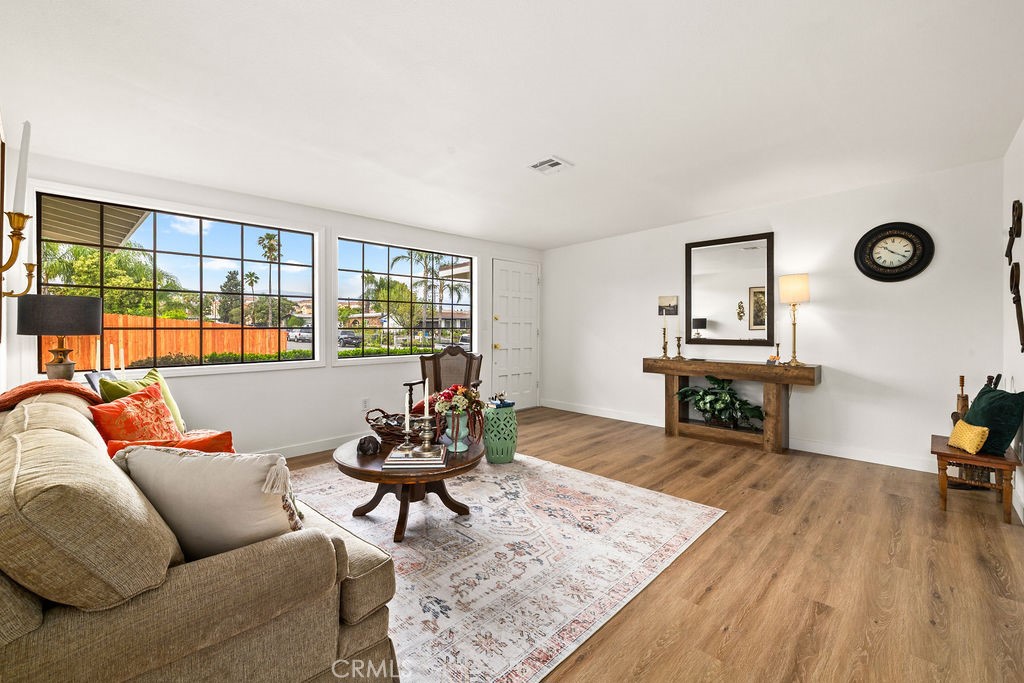 249 Alru Street Rialto, CA 92376 - Photo 6 of 33 Spacious living room with large windows and abundant natural light