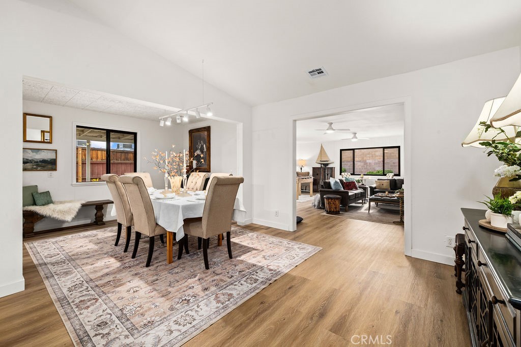 249 Alru Street Rialto, CA 92376 - Photo 9 of 33 Formal dining area with chandelier and open access to living spaces