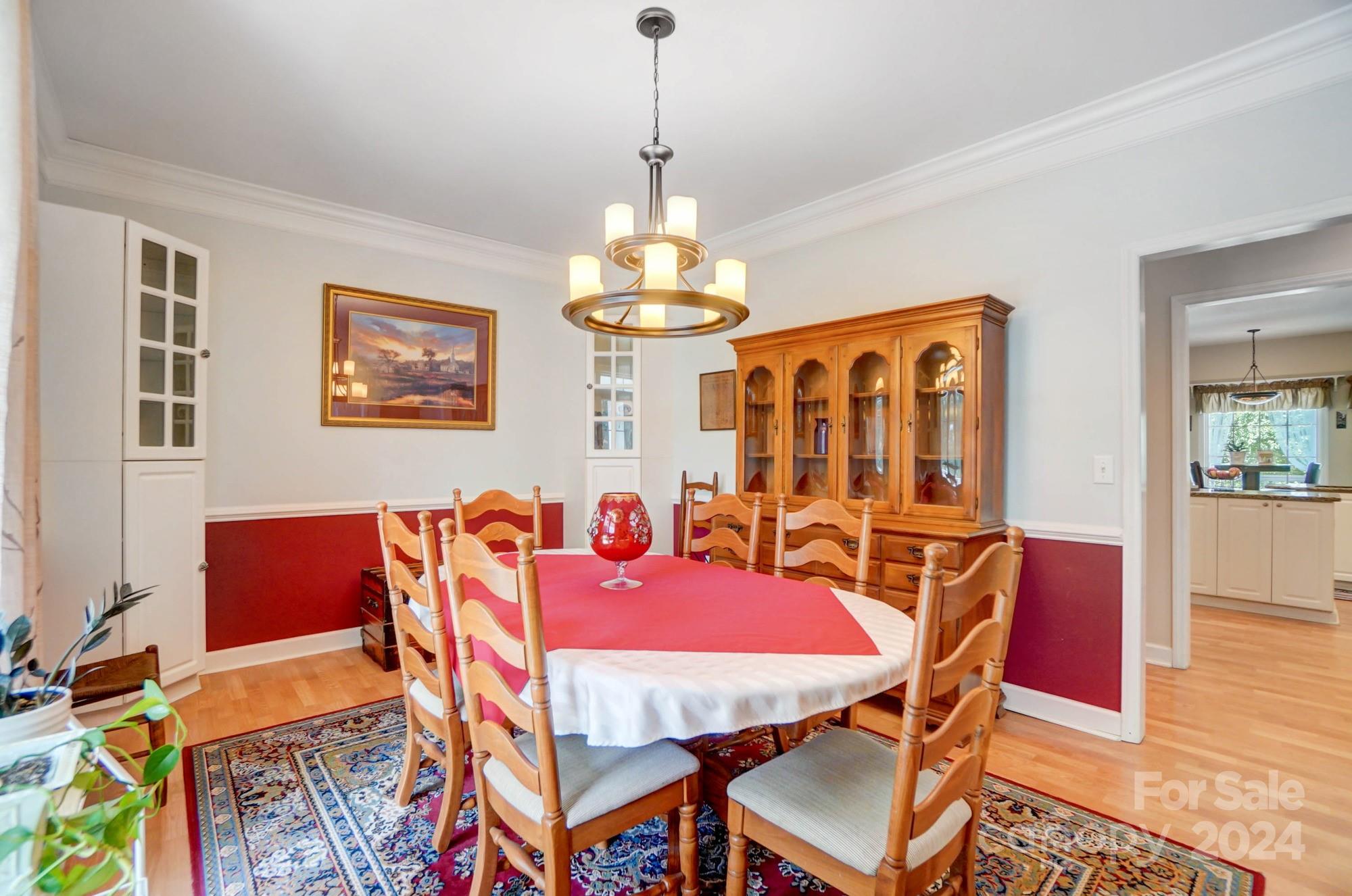 8387 Fairfield Forest Road Denver, NC 28037 - Photo 17 of 38 a dining room with furniture and window