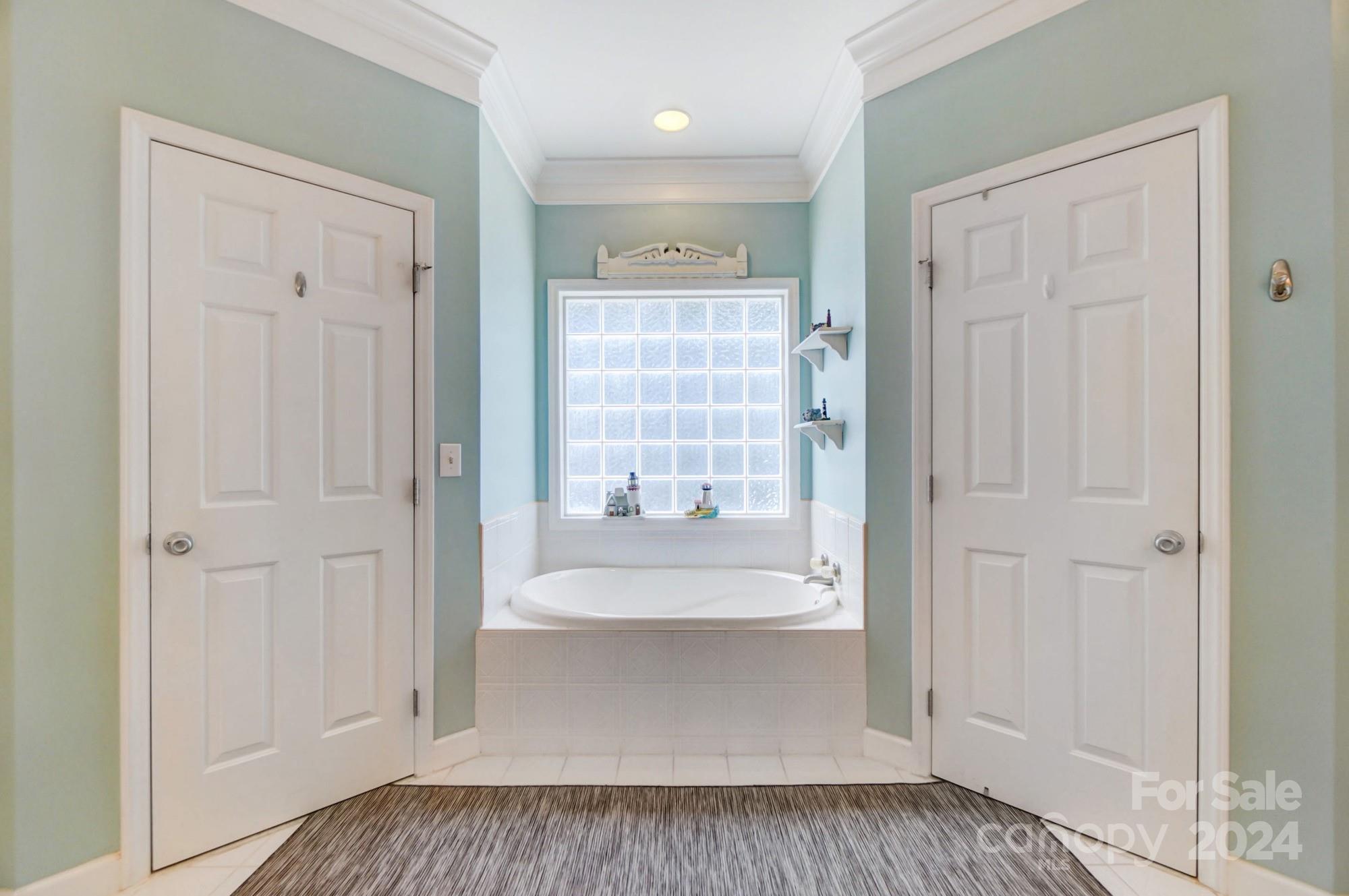 8387 Fairfield Forest Road Denver, NC 28037 - Photo 22 of 38 a view of front door with wooden floor