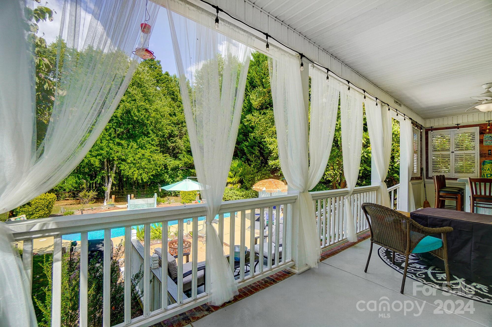 8387 Fairfield Forest Road Denver, NC 28037 - Photo 28 of 38 a view of balcony with furniture