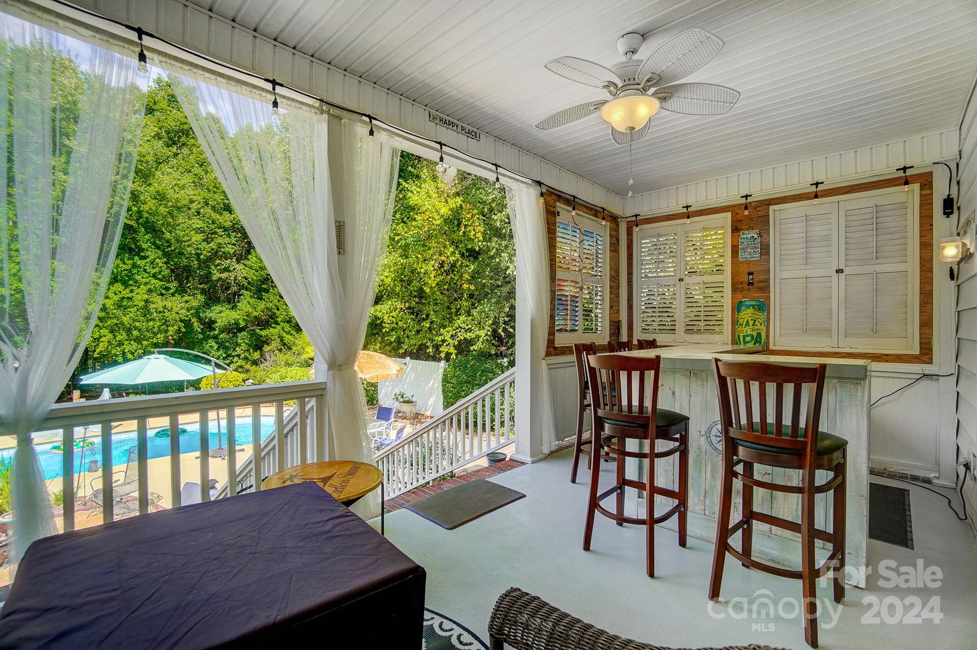 8387 Fairfield Forest Road Denver, NC 28037 - Photo 29 of 38 a view of a dining room with furniture window and outside view