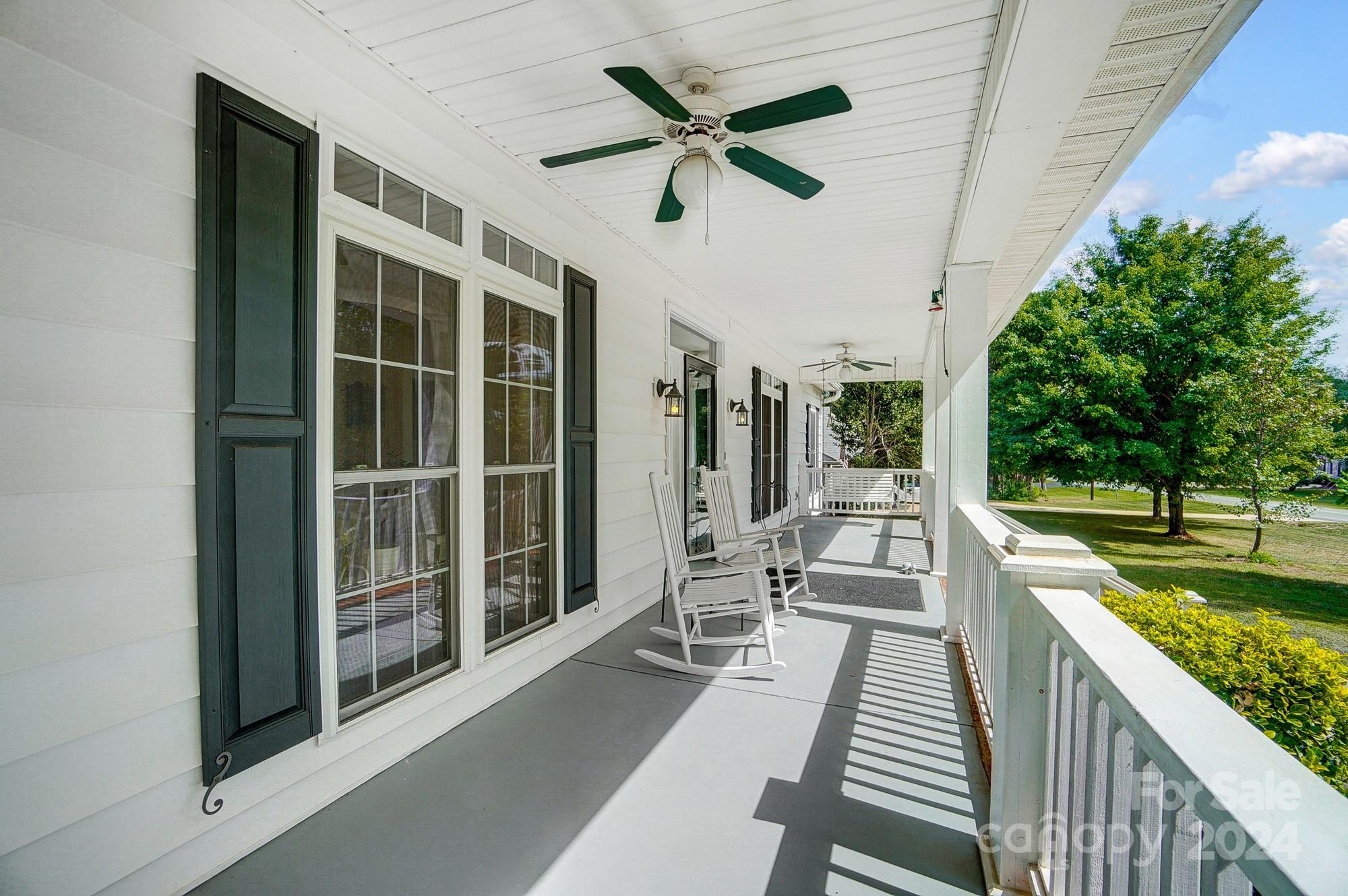 8387 Fairfield Forest Road Denver, NC 28037 - Photo 5 of 38 a view of a balcony with couch