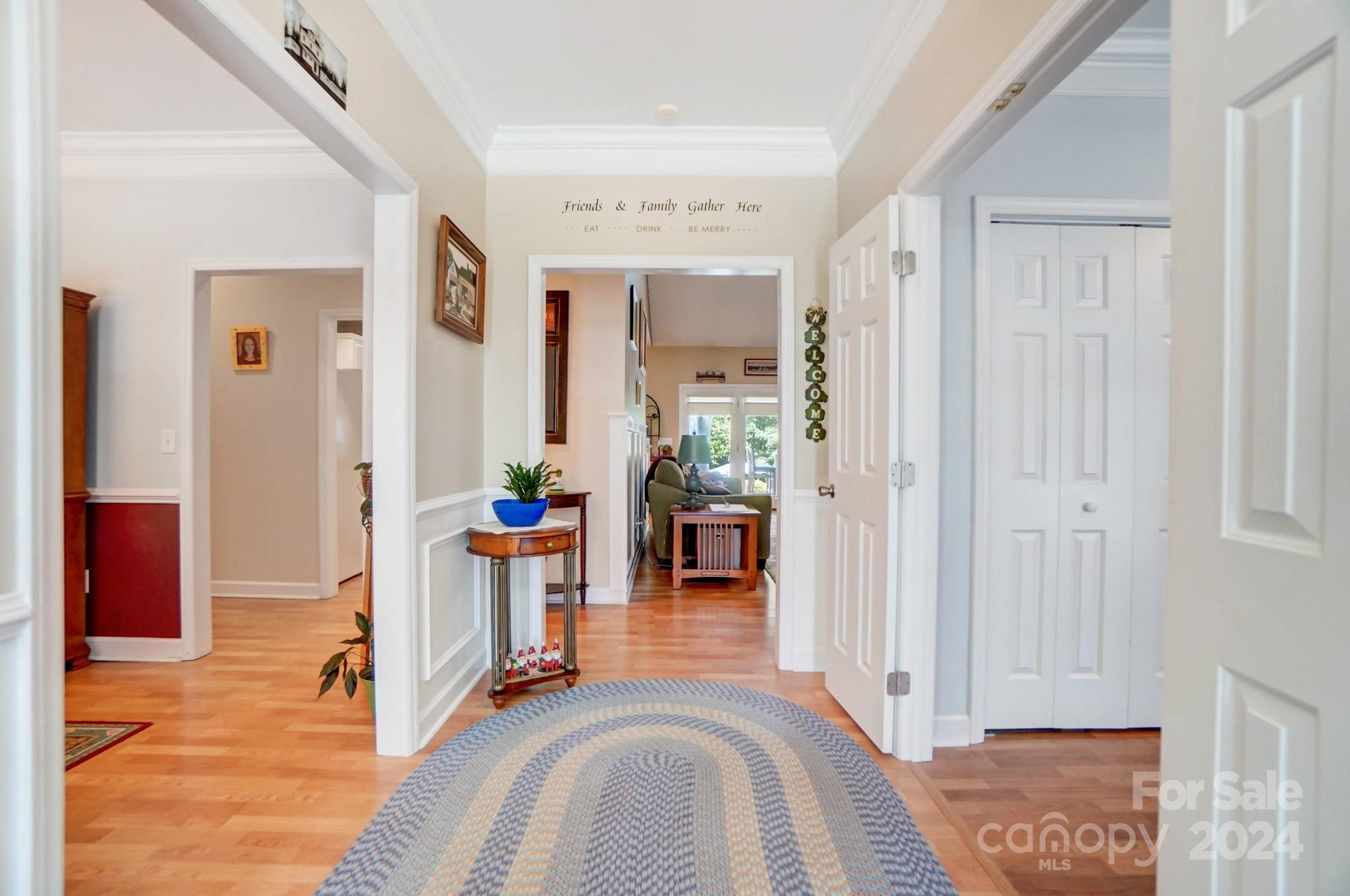 8387 Fairfield Forest Road Denver, NC 28037 - Photo 7 of 38 a view of a livingroom with wooden floor and furniture