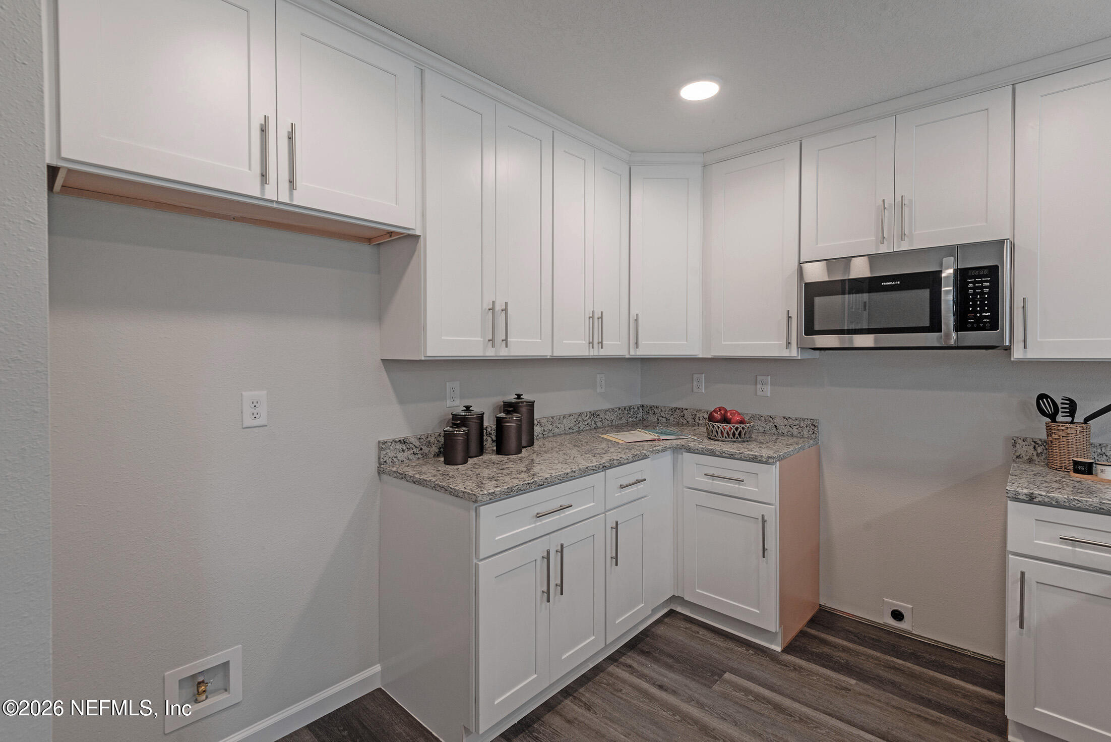 13611 Benton Street Jacksonville, FL 32218 - Photo 14 of 32 a kitchen with a sink and cabinets