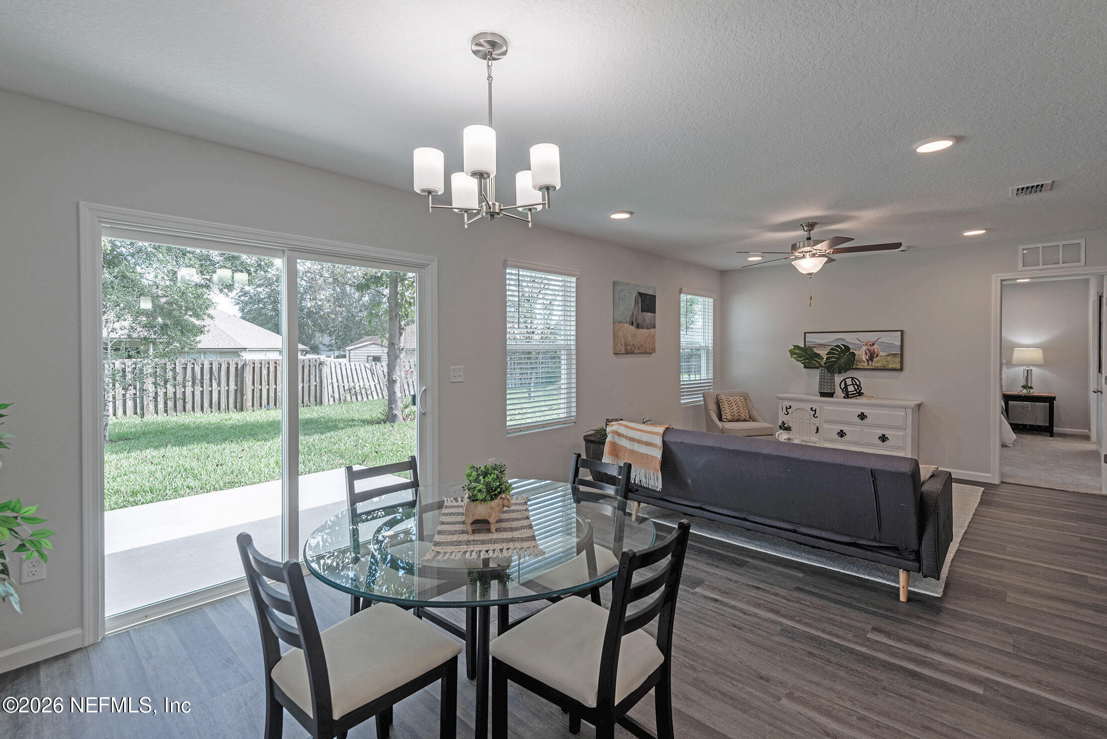 13611 Benton Street Jacksonville, FL 32218 - Photo 21 of 32 a view of a dining room with furniture window and outside view