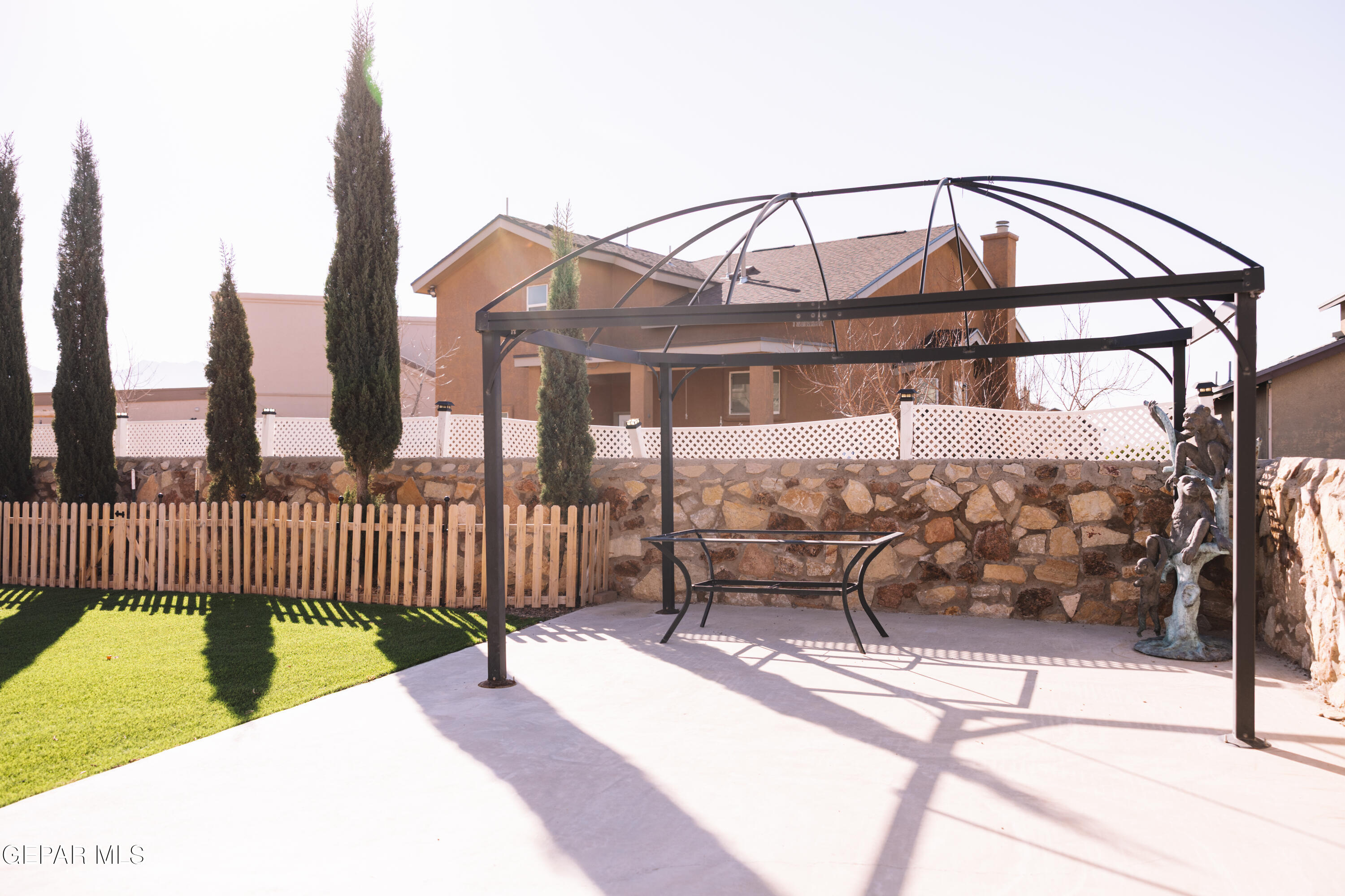 6824 Inca Dove El Paso, TX 79911 - Photo 13 of 18 a view of a house with a wooden deck