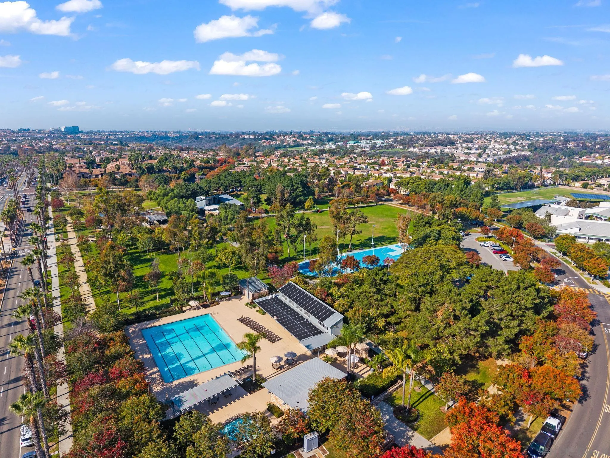 1441 Santa Lucia Road, Unit 615 Chula Vista, CA 91913 - Photo 25 of 31 an aerial view of residential houses with outdoor space and trees
