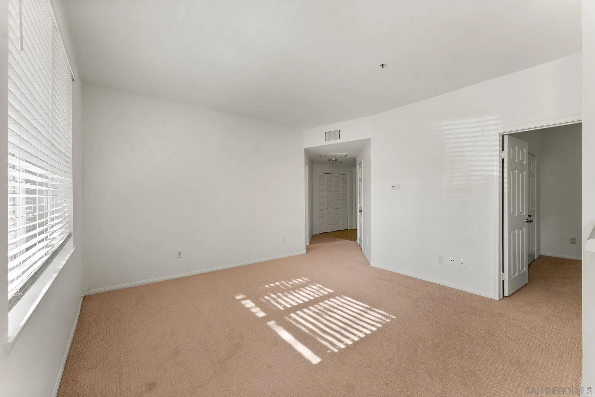 1441 Santa Lucia Road, Unit 615 Chula Vista, CA 91913 - Photo 10 of 31 a view of room with window and a ceiling fan