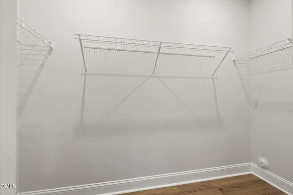 a view of a room with racks on the wall