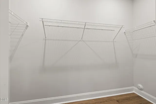 a view of a room with racks on the wall