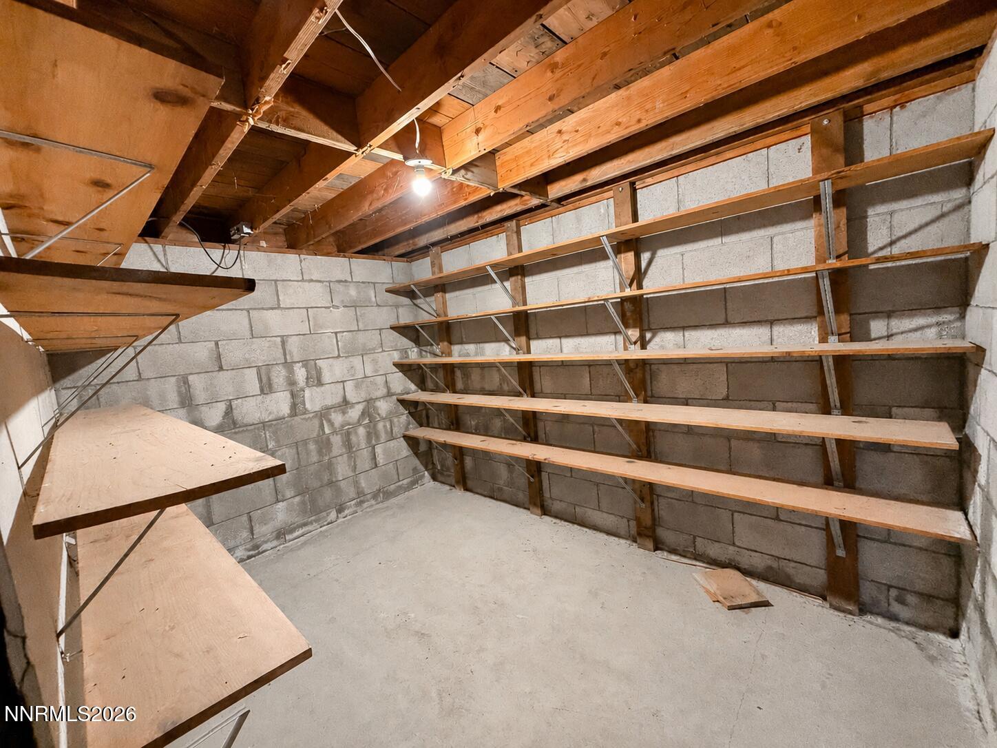 3250 Youngberg Road Winnemucca, NV 89445 - Photo 16 of 49 a view of an empty room with empty shelves