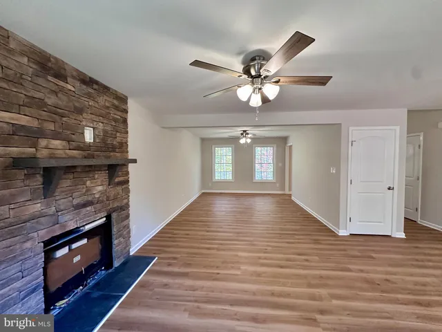 a view of room with window and entryway