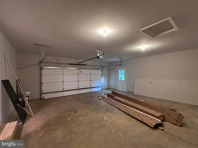 a house with trees in the background