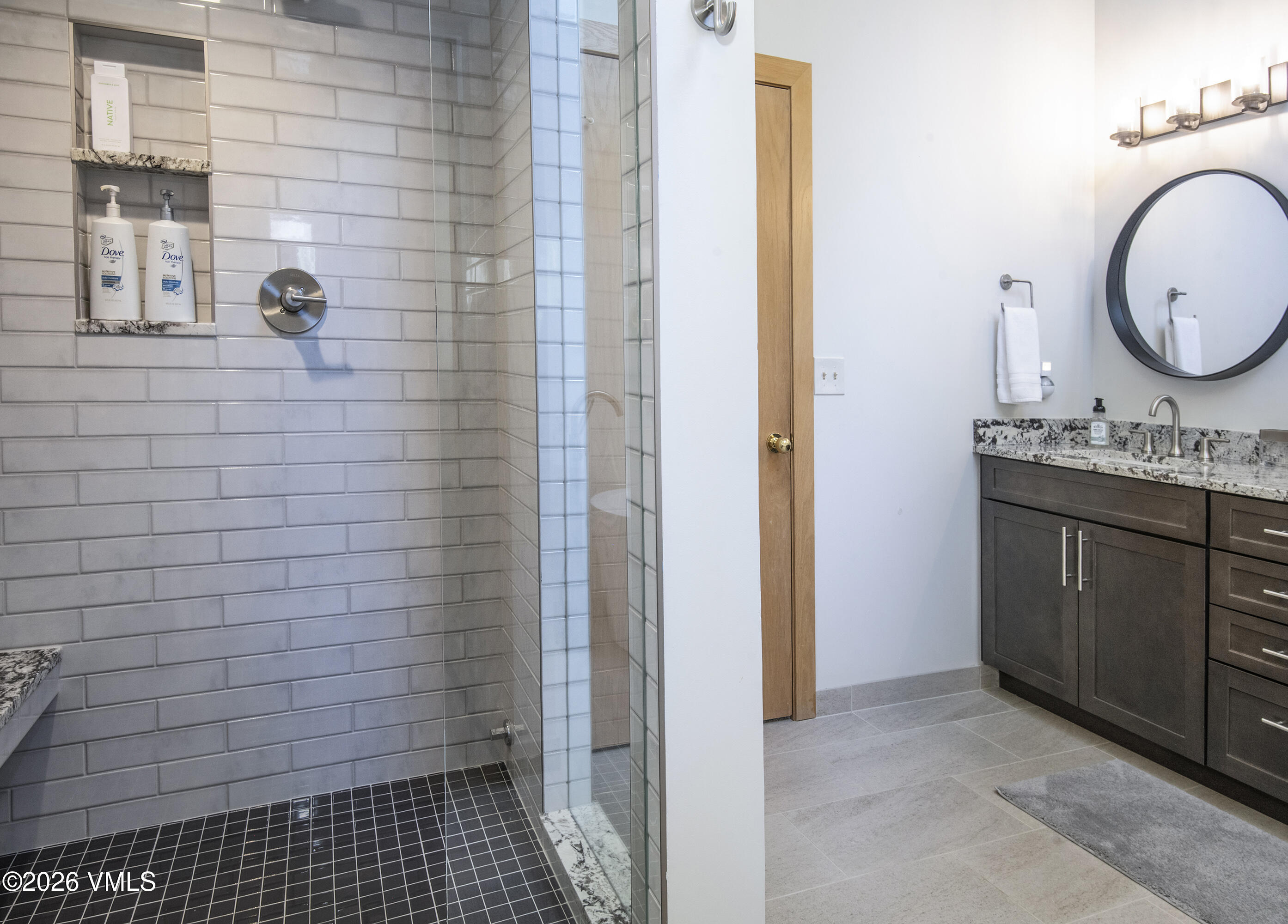 5159 Gore Circle Vail, CO 81657 - Photo 13 of 36 a bathroom with a sink and a mirror