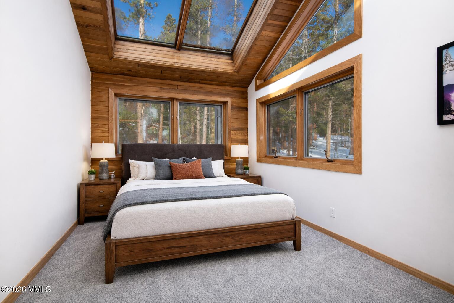 5159 Gore Circle Vail, CO 81657 - Photo 15 of 36 a bedroom with a bed and window