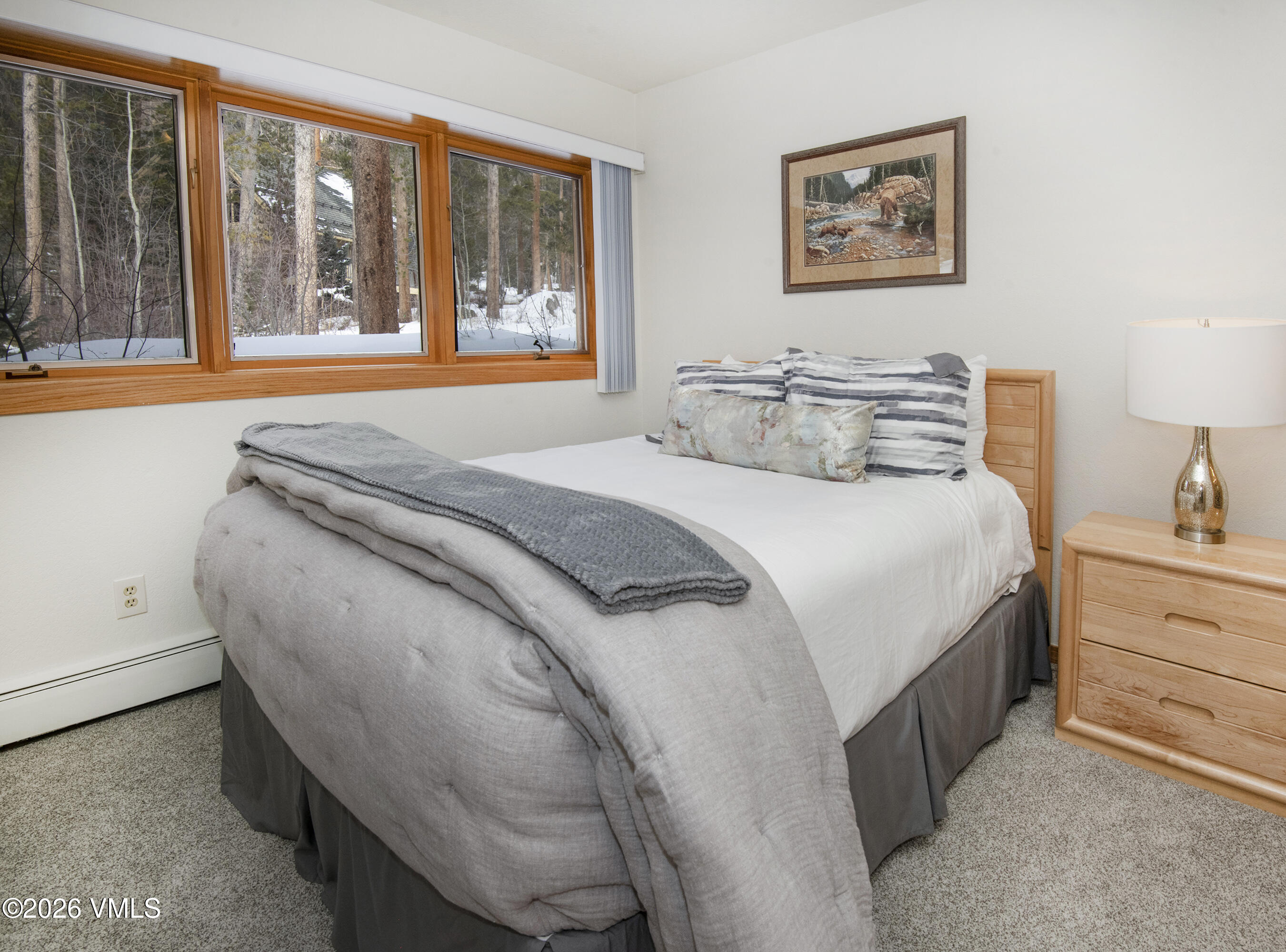 5159 Gore Circle Vail, CO 81657 - Photo 20 of 36 a bedroom with a bed and a large window