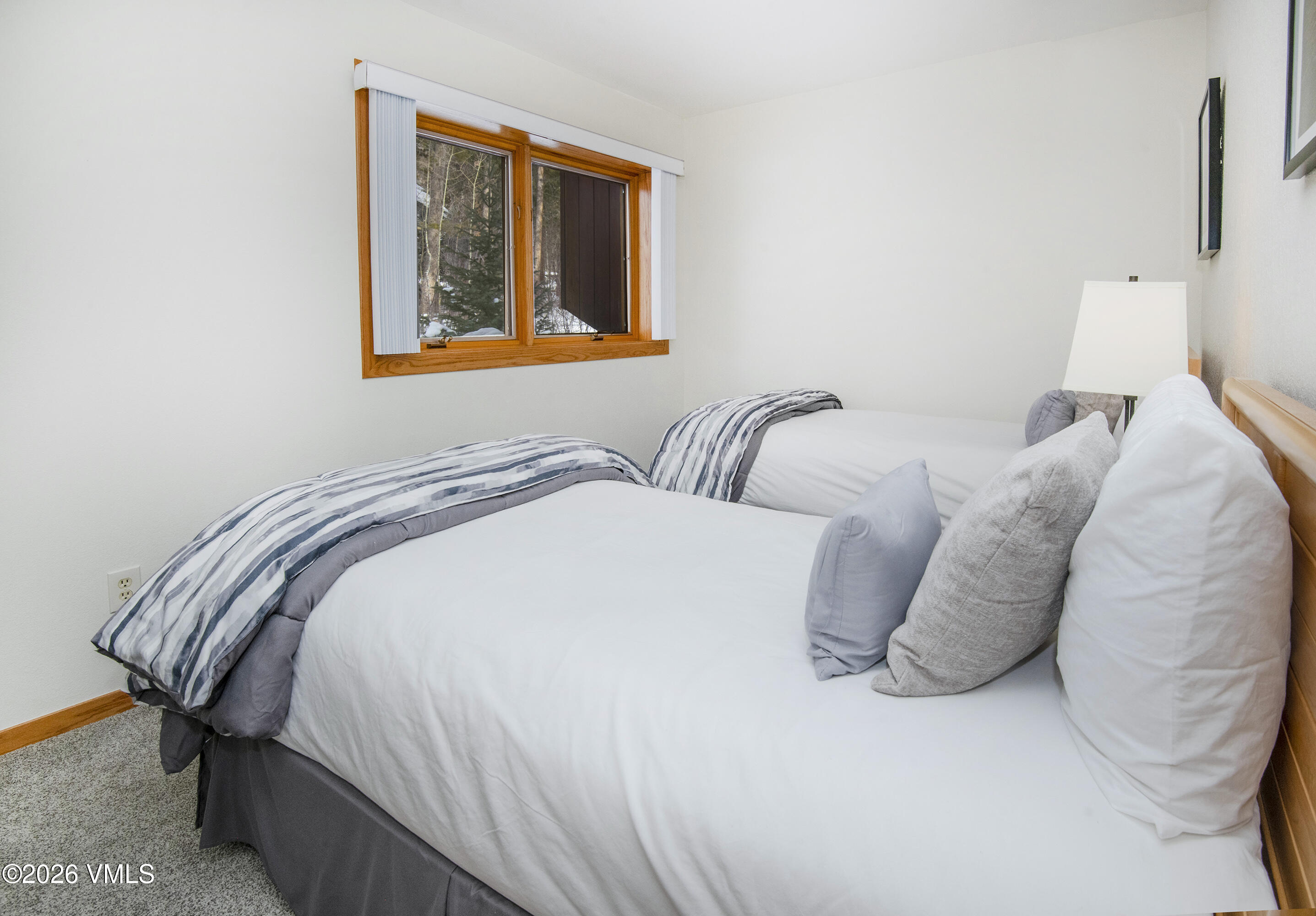 5159 Gore Circle Vail, CO 81657 - Photo 22 of 36 a bedroom with a bed and painting on the wall