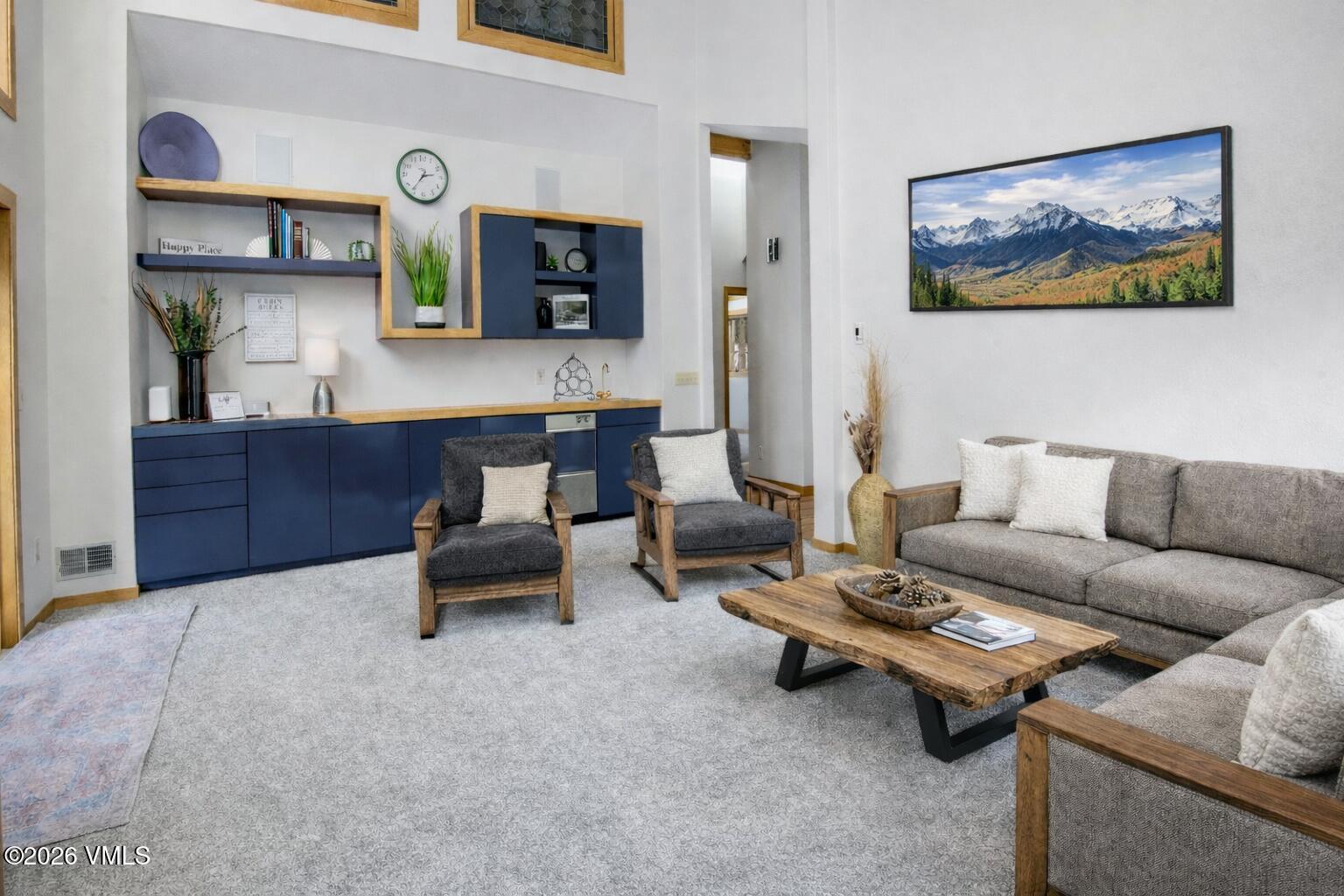 5159 Gore Circle Vail, CO 81657 - Photo 3 of 36 a living room with furniture and a wooden floor