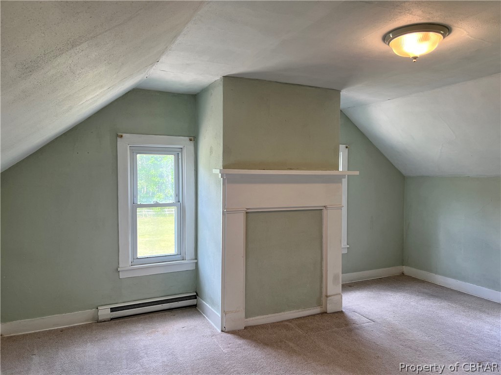 2138 Bethel Beach Road Onemo, VA 23130 - Photo 32 of 39 Bedroom 2 also has the original Mantle and painted wood floors under carpet