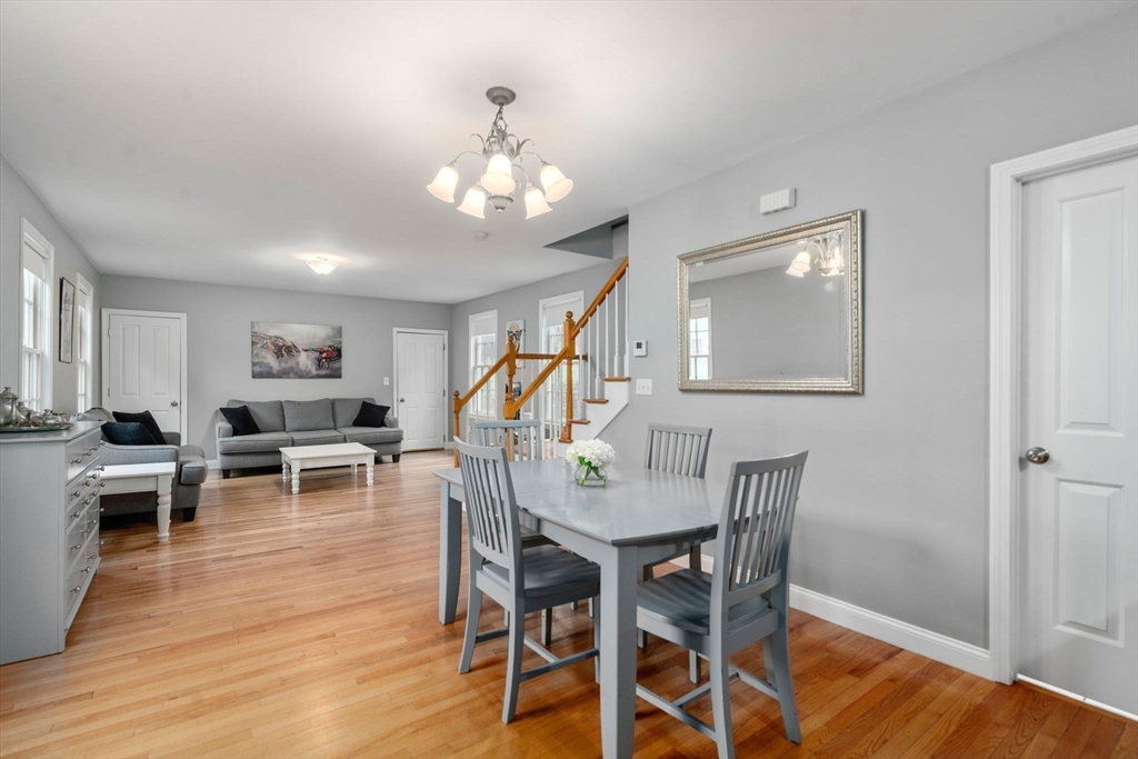 19 Winter Street Arlington, MA 02474 - Photo 23 of 39 a view of a dining room with furniture and wooden floor