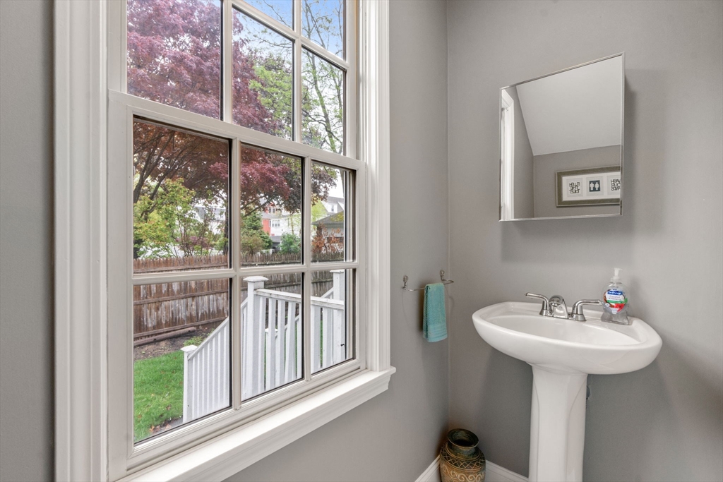 19 Winter Street Arlington, MA 02474 - Photo 24 of 39 a bathroom with a sink and a window