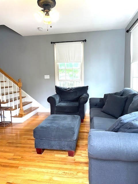 19 Winter Street Arlington, MA 02474 - Photo 31 of 39 a living room with furniture and a large window