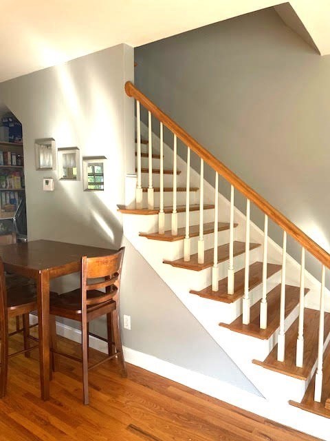 19 Winter Street Arlington, MA 02474 - Photo 32 of 39 a view of kitchen with dining room and wooden floor