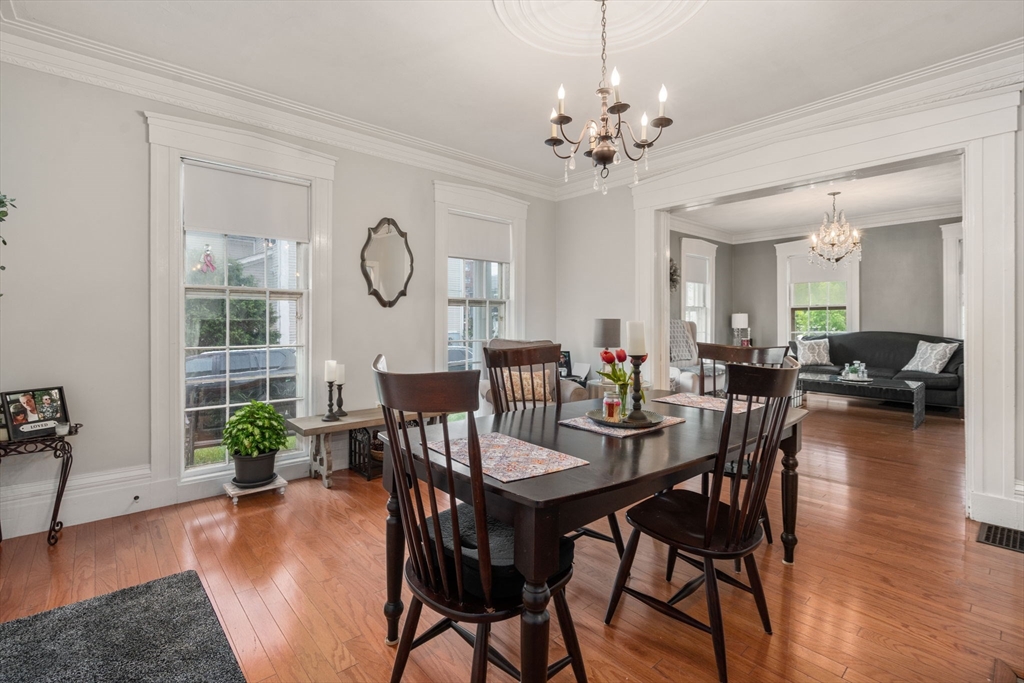 19 Winter Street Arlington, MA 02474 - Photo 7 of 39 a view of a dining room with furniture window and wooden floor