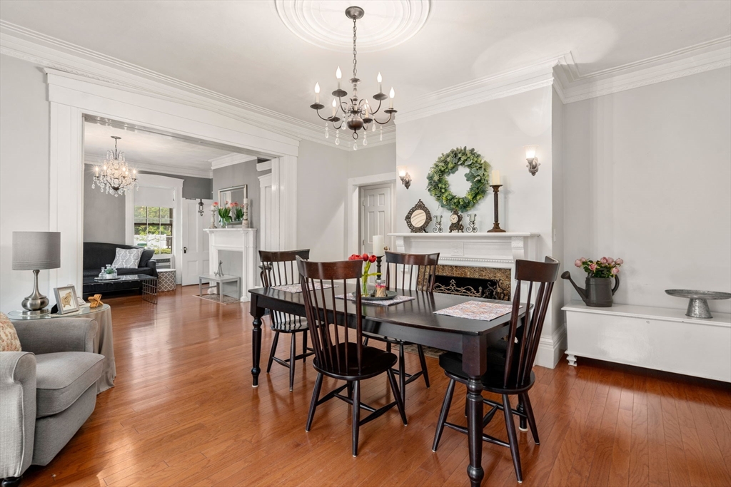 19 Winter Street Arlington, MA 02474 - Photo 8 of 39 a view of a dining room with furniture and wooden floor