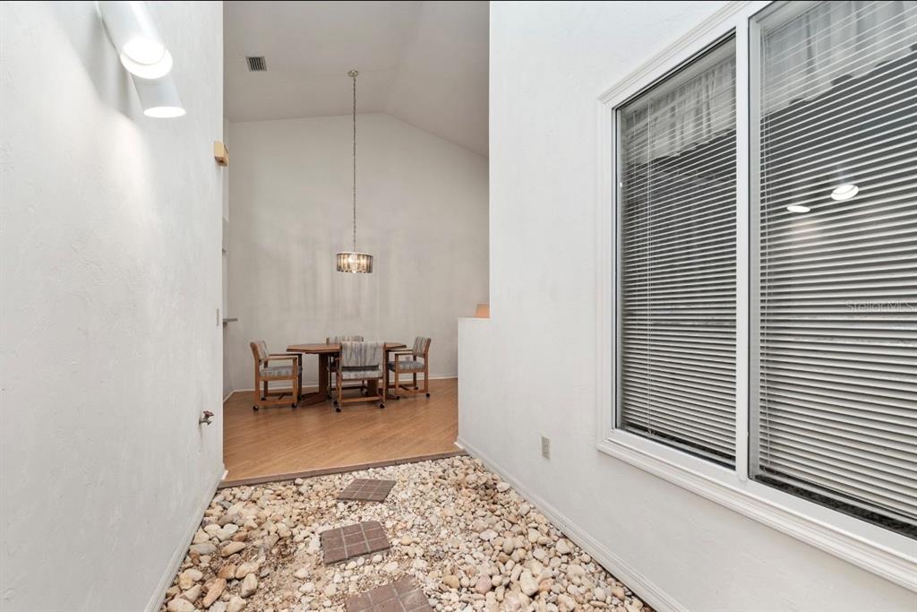 907 Southwest 51 Way Gainesville, FL 32607 - Photo 21 of 45 a view of living room with a rug and a table