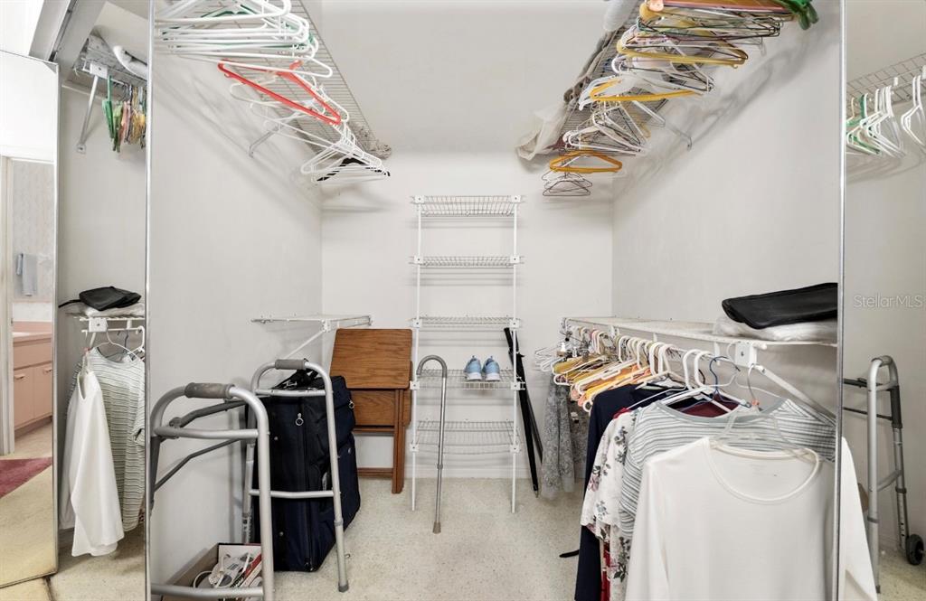 907 Southwest 51 Way Gainesville, FL 32607 - Photo 26 of 45 a view of walk in closet with clothes and shoes