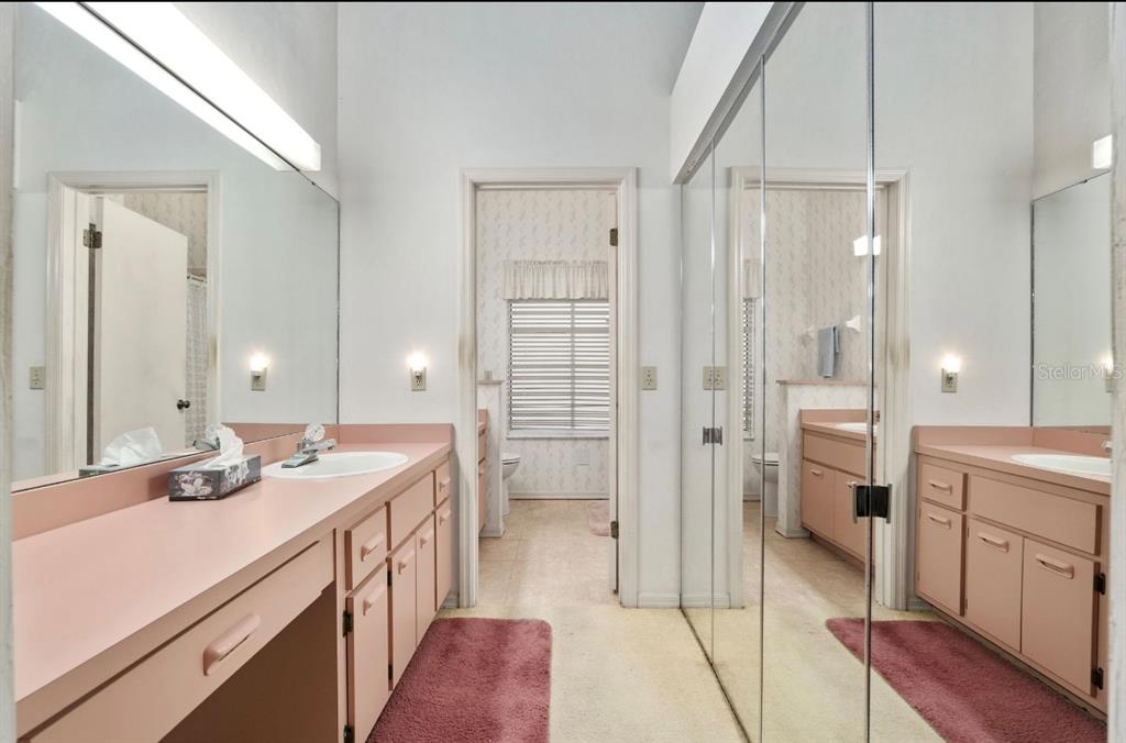 907 Southwest 51 Way Gainesville, FL 32607 - Photo 27 of 45 a bathroom with a sink a toilet and shower