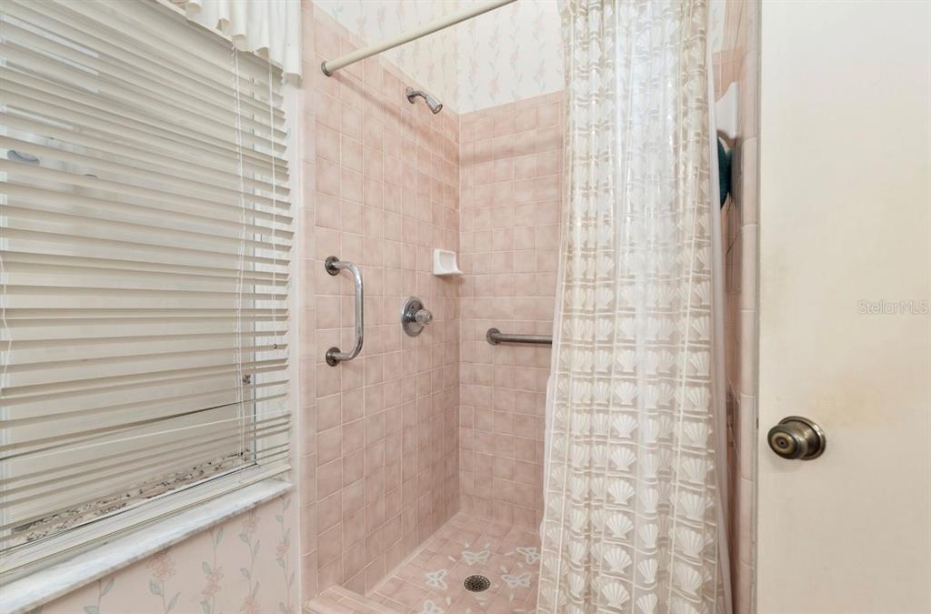 907 Southwest 51 Way Gainesville, FL 32607 - Photo 30 of 45 a bathroom with a shower