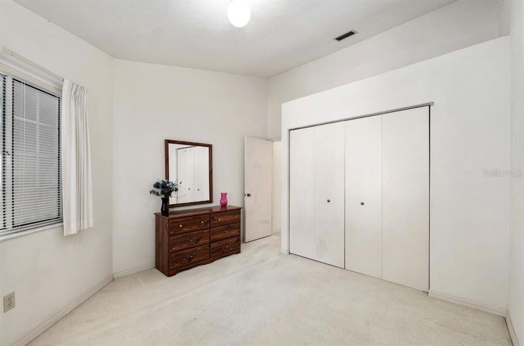 907 Southwest 51 Way Gainesville, FL 32607 - Photo 33 of 45 a view of a livingroom with a dresser