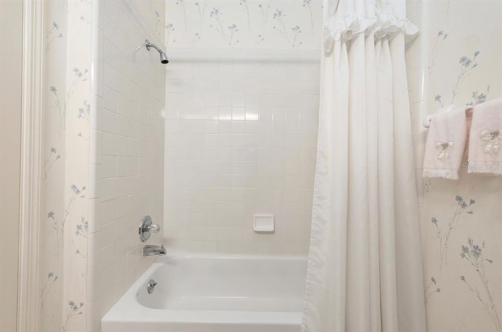 907 Southwest 51 Way Gainesville, FL 32607 - Photo 35 of 45 a close up of a bathtub curtain