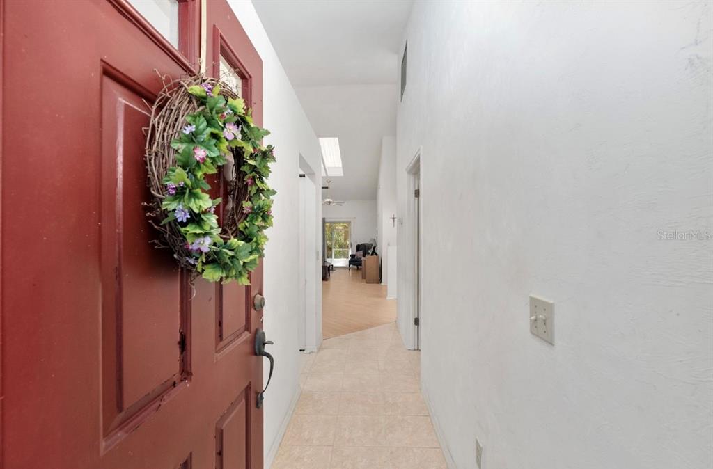 907 Southwest 51 Way Gainesville, FL 32607 - Photo 4 of 45 a view of a house with a plant