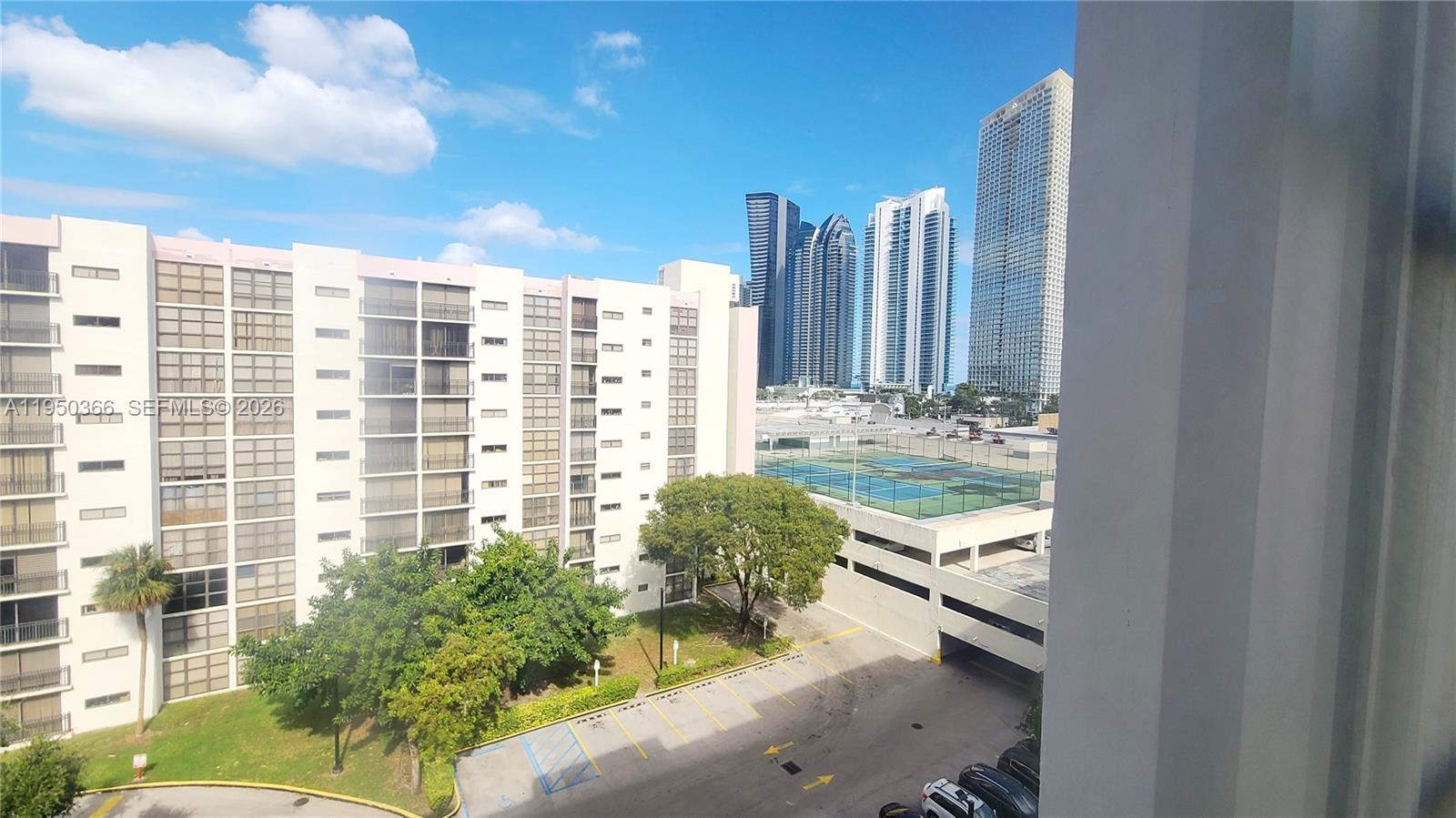 16909 North Bay Road, Unit 806 Sunny Isles Beach, FL 33160 - Photo 12 of 27 a view of balcony with a potted plant