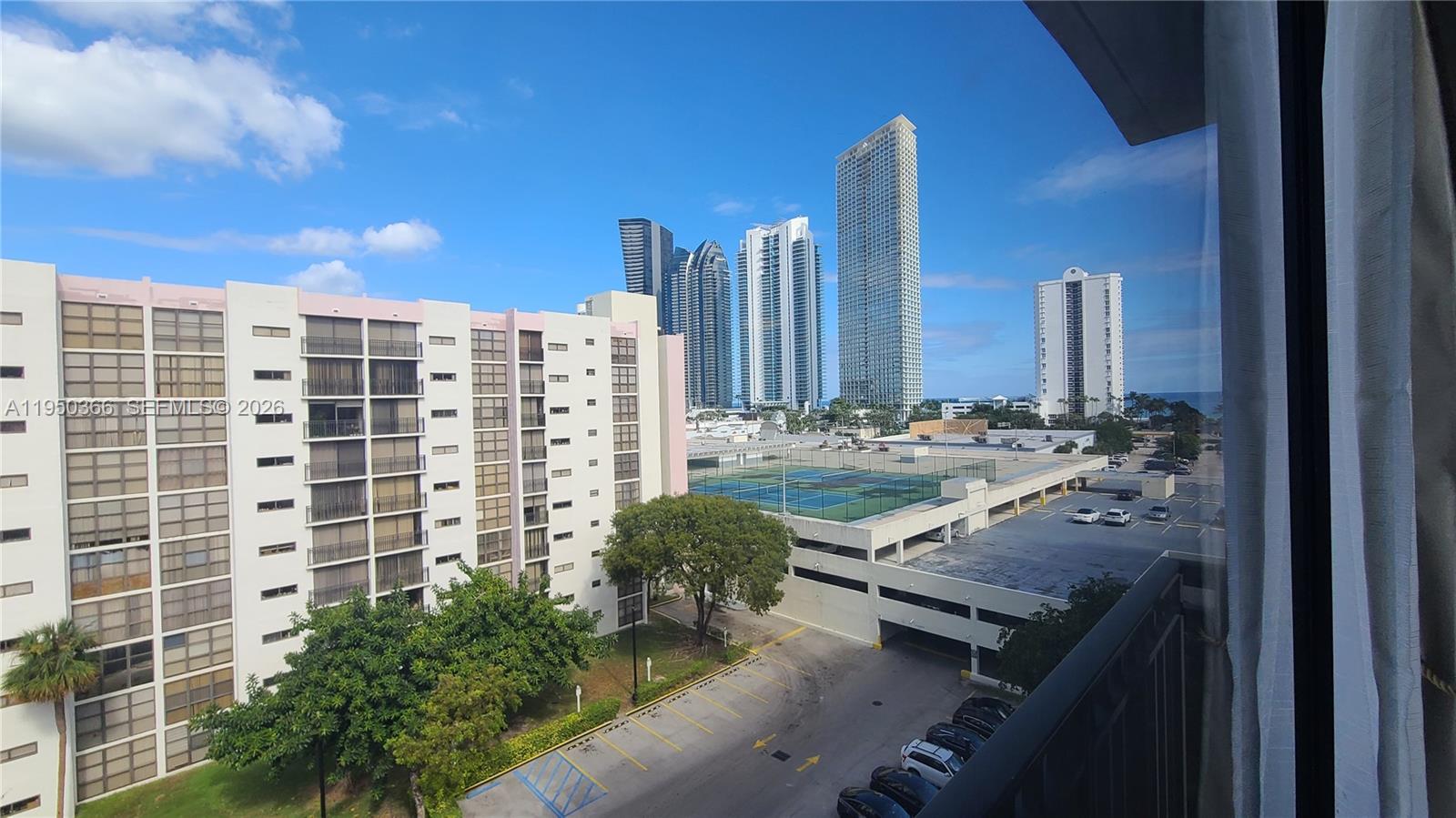 16909 North Bay Road, Unit 806 Sunny Isles Beach, FL 33160 - Photo 17 of 27 a view of a balcony with a potted plants
