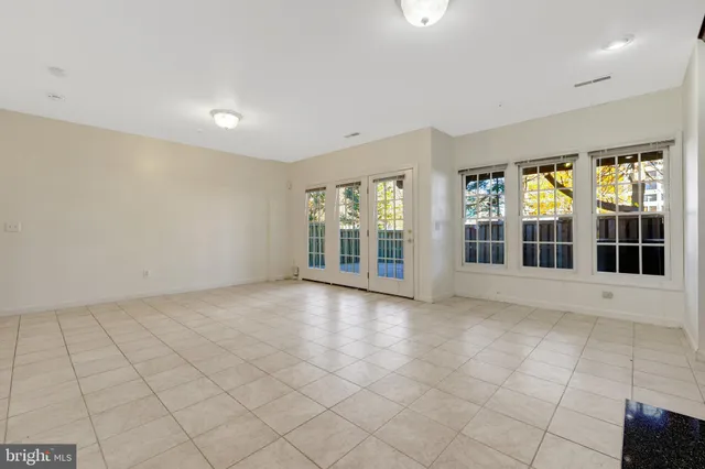 a bathroom with a toilet sink and shower