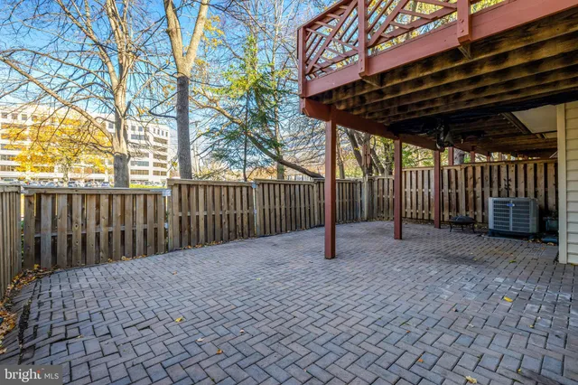 a view of a house with a tree