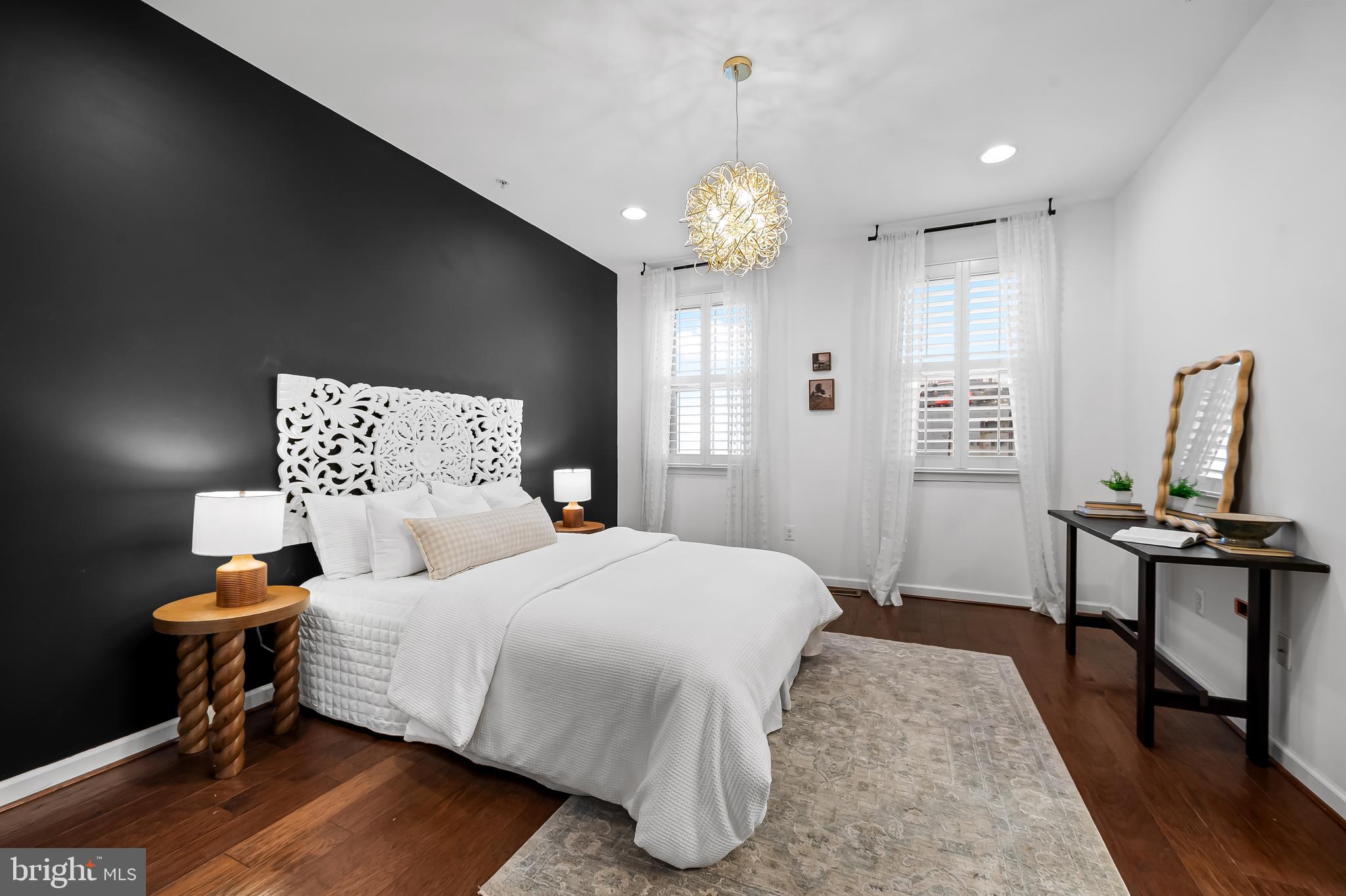 1602 Rampart Mews Baltimore, MD 21230 - Photo 22 of 49 primary bedroom with ensuite and water views