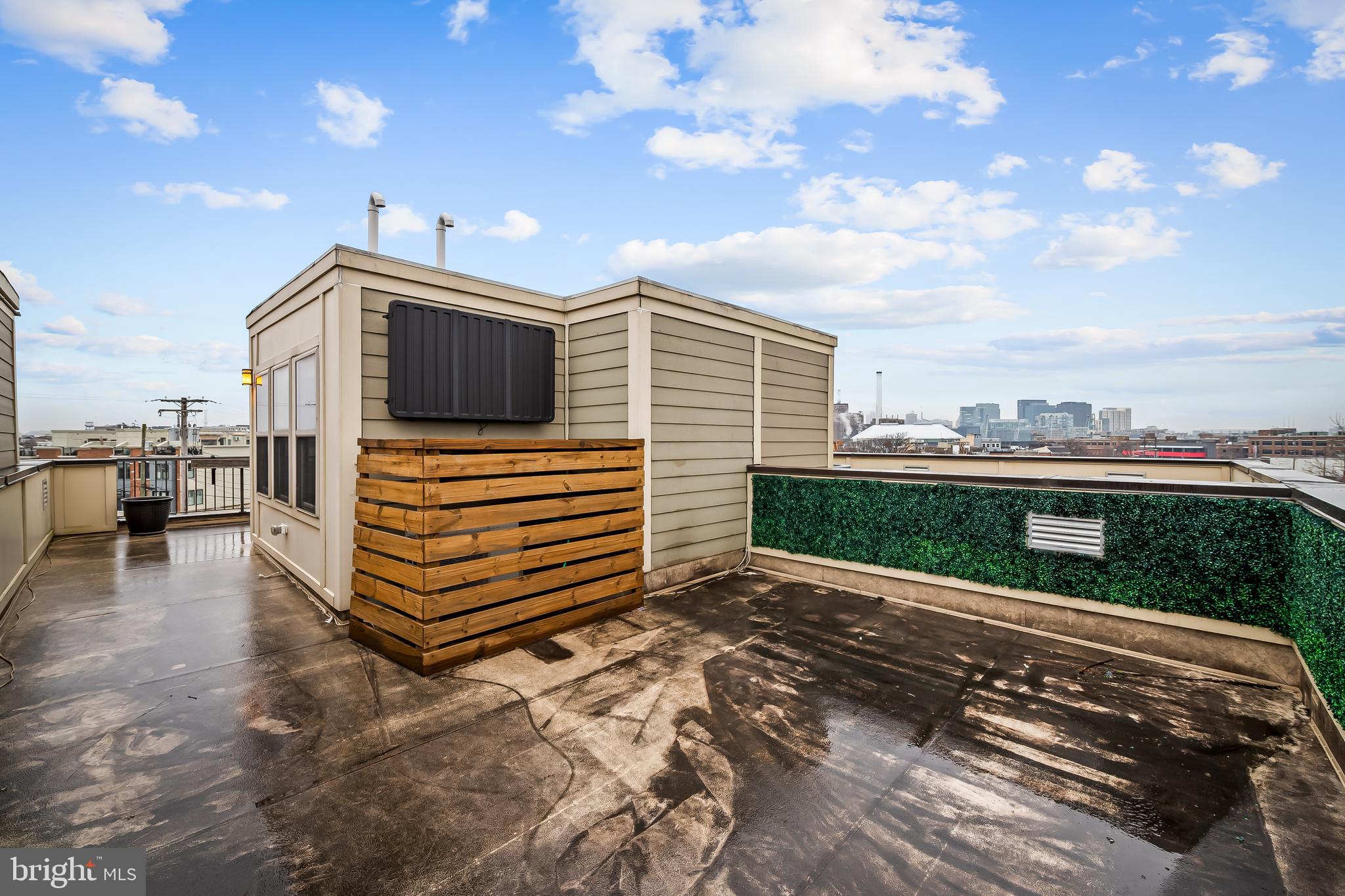 1602 Rampart Mews Baltimore, MD 21230 - Photo 37 of 49 roof terrance with tv and water views