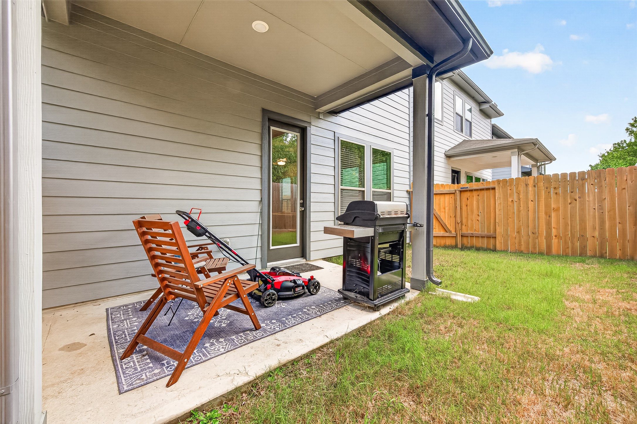 4004 Baja Lane Houston, TX 77045 - Photo 32 of 34 Enjoy peace of mind in this spacious backyard, securely wrapped in a wooden privacy fence. The functional concrete patio area offers a crisp, clean layout that easily adapts to your specific entertaining or relaxing needs.
