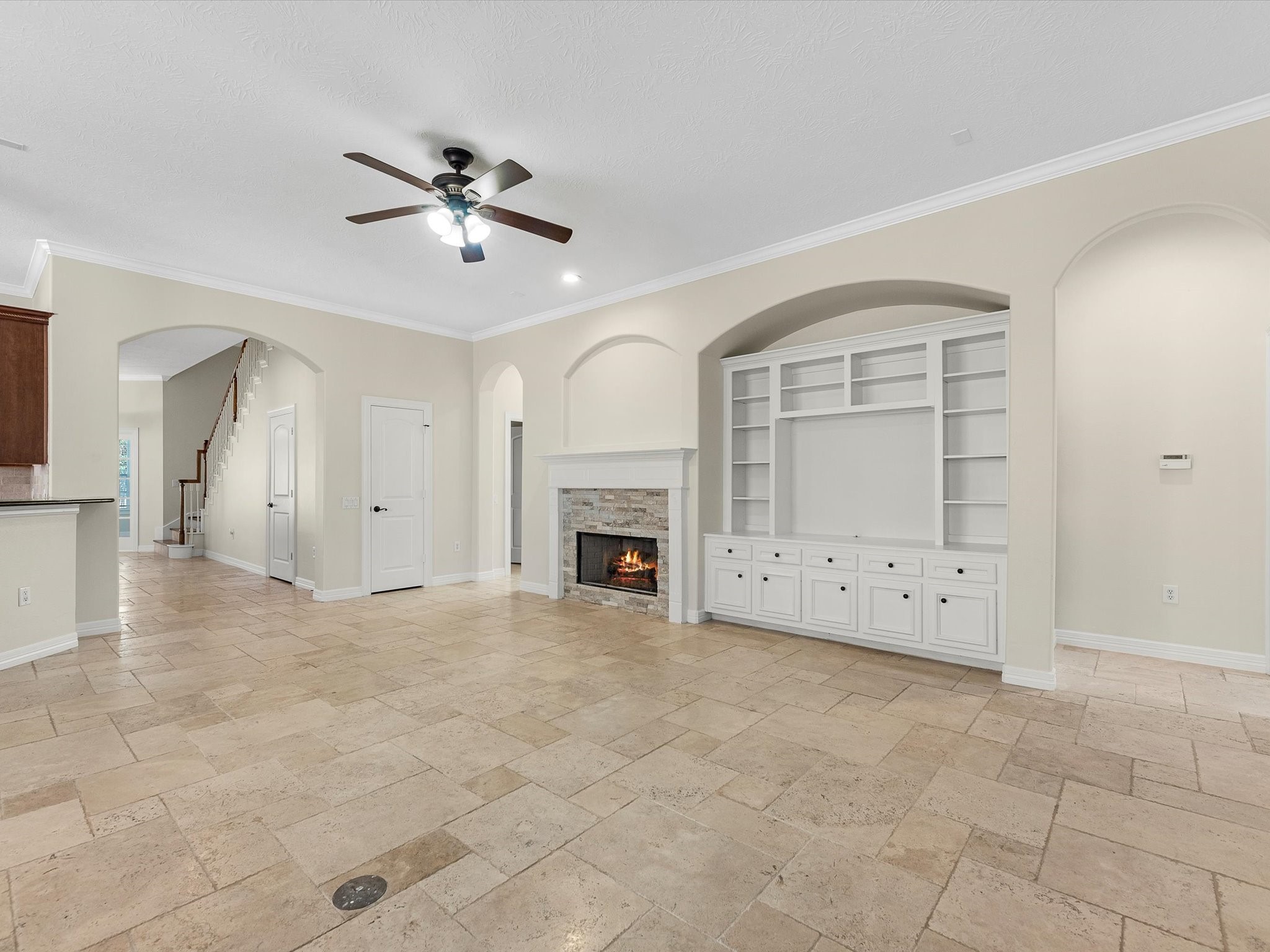31 Tarrytown Way Conroe, TX 77384 - Photo 12 of 41 a view of a livingroom with an empty space and a fireplace